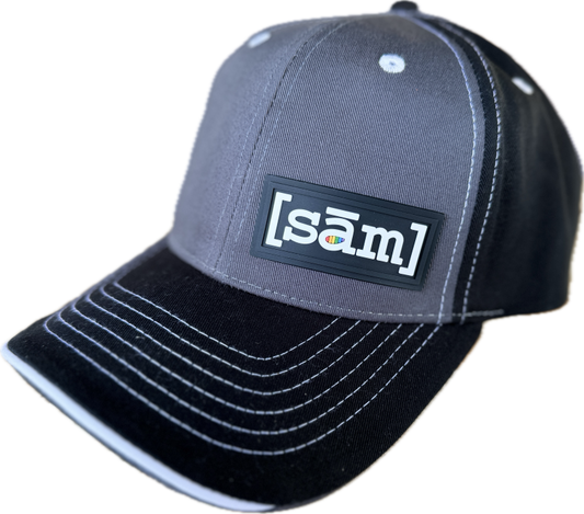 Black and Gray Trucker Hat with Same Apparel PVC Logo